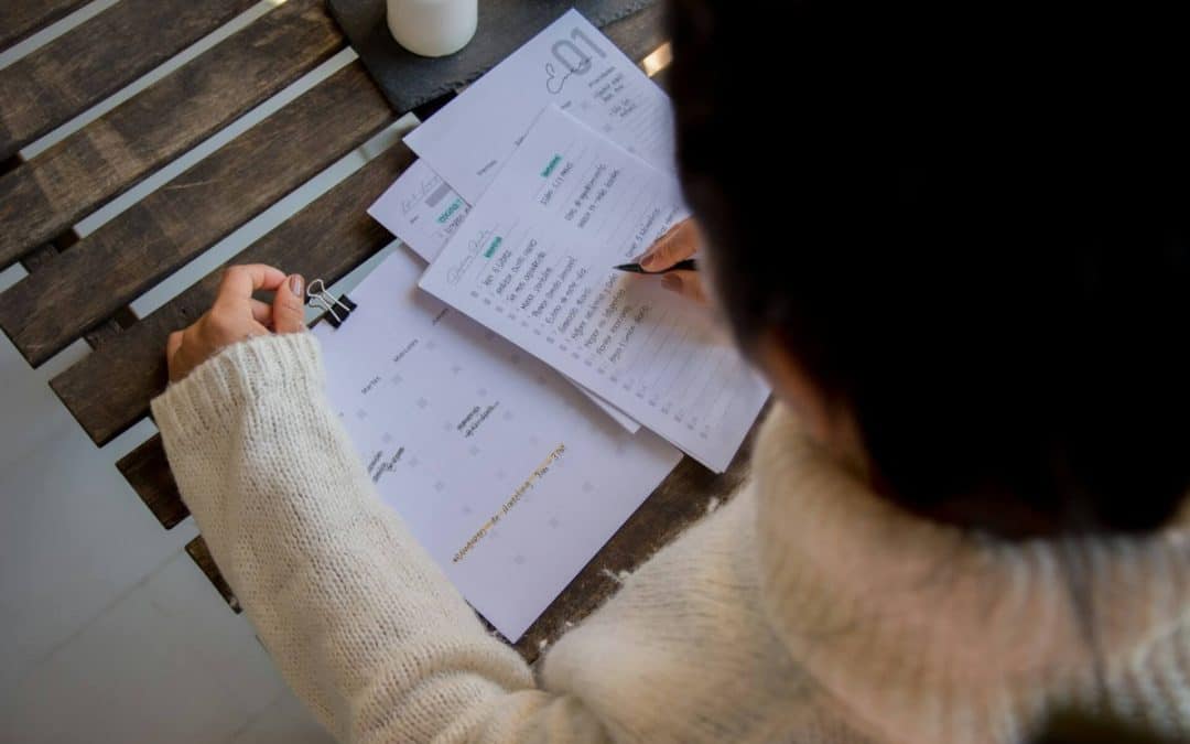 Woman reviewing financial documents to understand her finances after separation