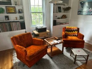 two comfortable chairs ready for couple to take part in family mediation