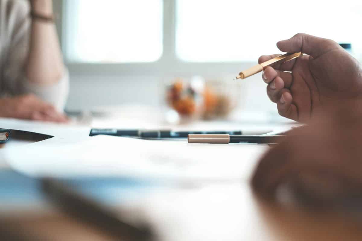 couple discussing finances and paperwork during separation